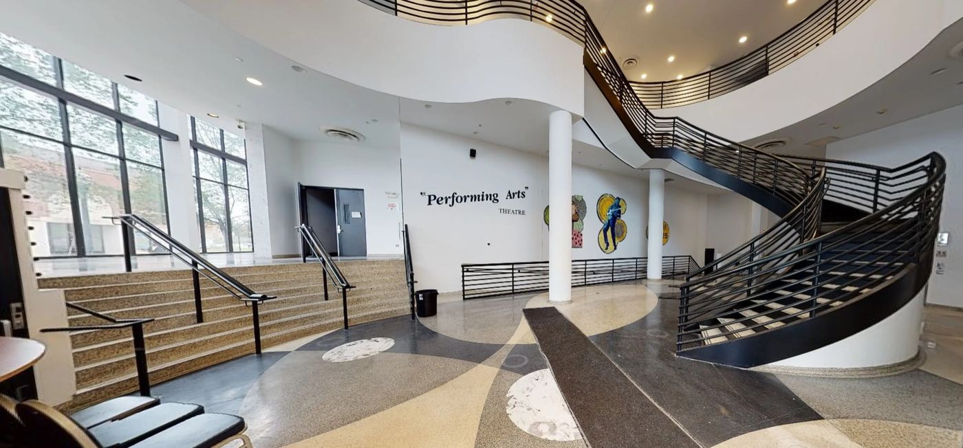 The two-story cascading atrium and grand staircase inside the Harold Washington Cultural Center